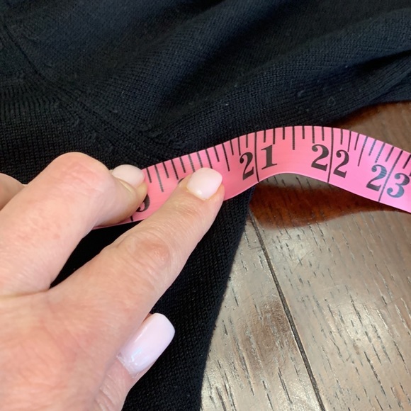 Black V neck Fever sweater with flaired sleeves and around hips. - Picture 7 of 8